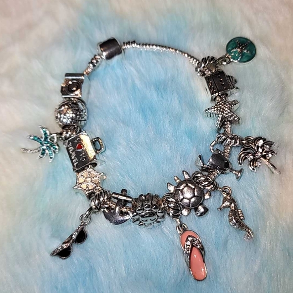 Silver tone charm bracelet, travel beach theme 7 to 8 in - Picture 1 of 9